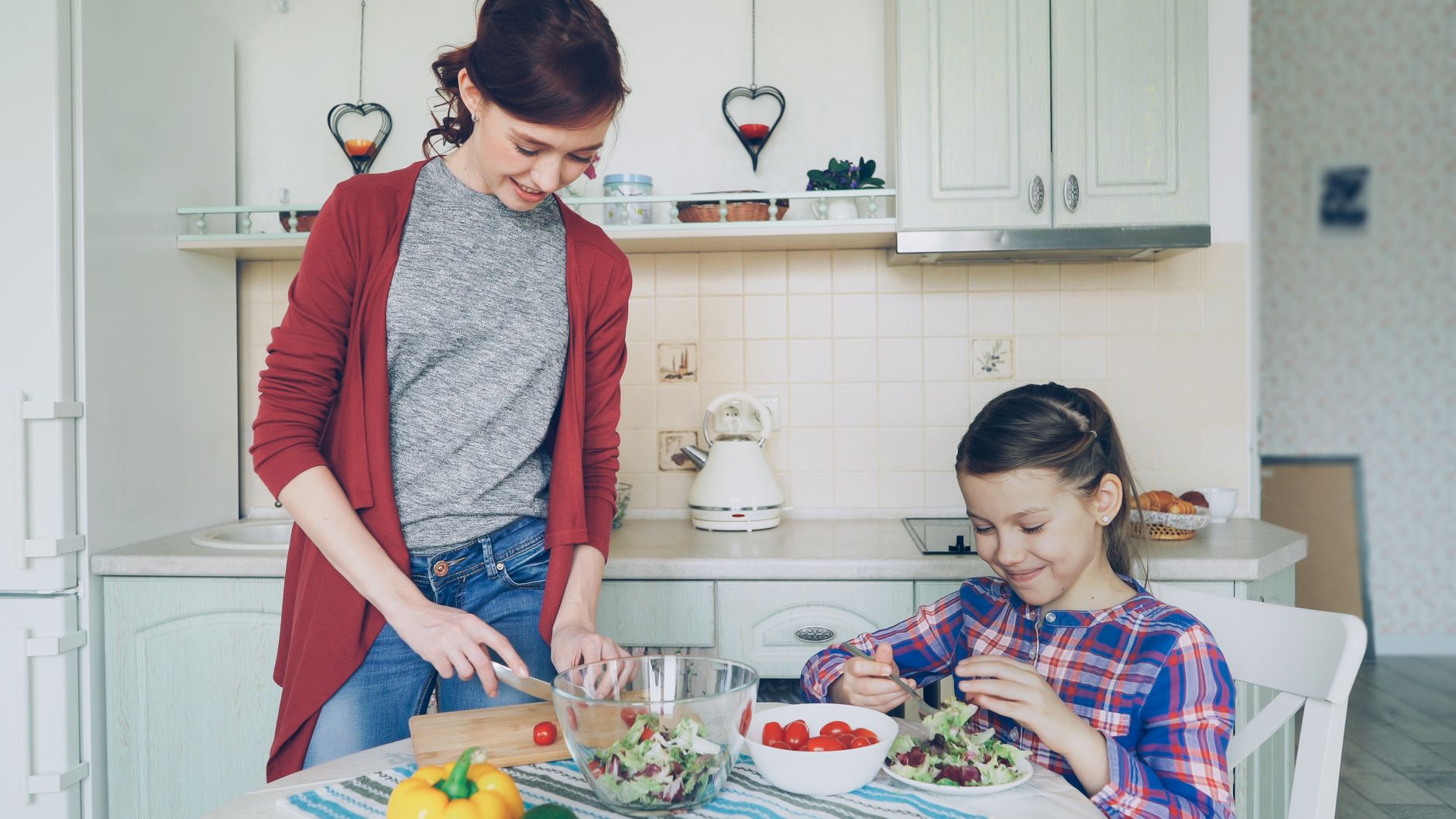 woman preparing healthy salad bowl kitchen