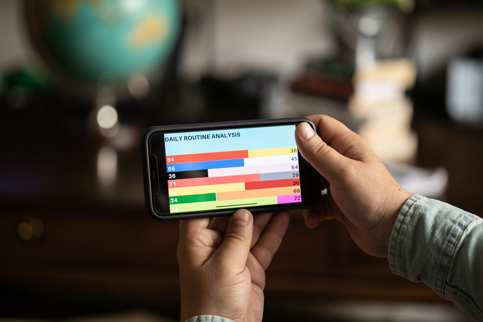 hand holding smartphone checking signal bars