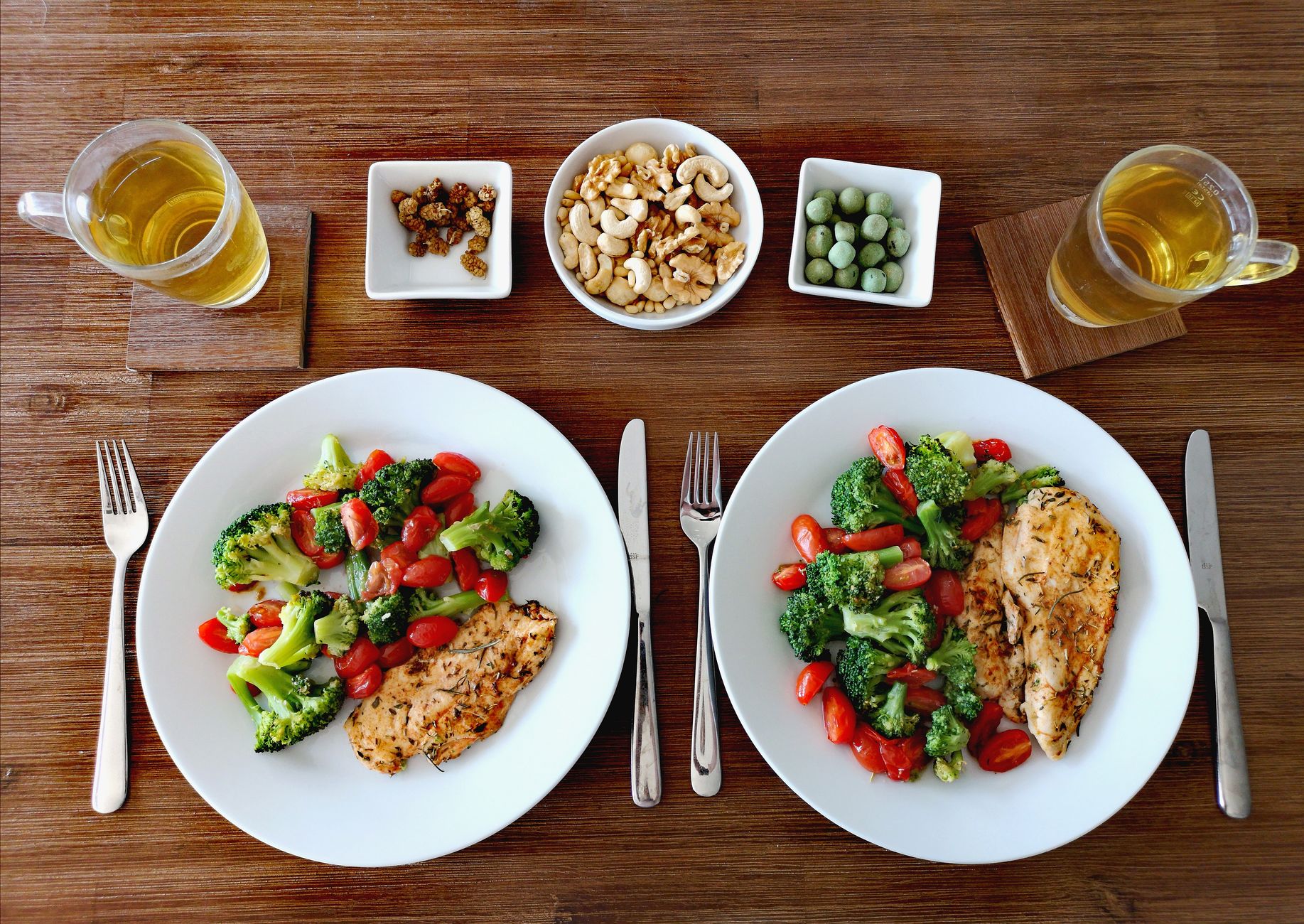 steamed chicken breast and vegetables on plate