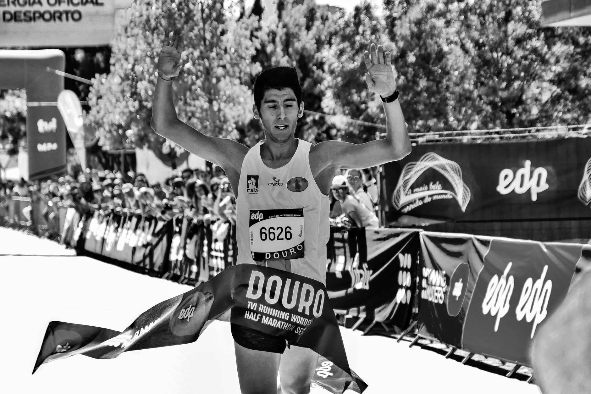 runners crossing finish line marathon race
