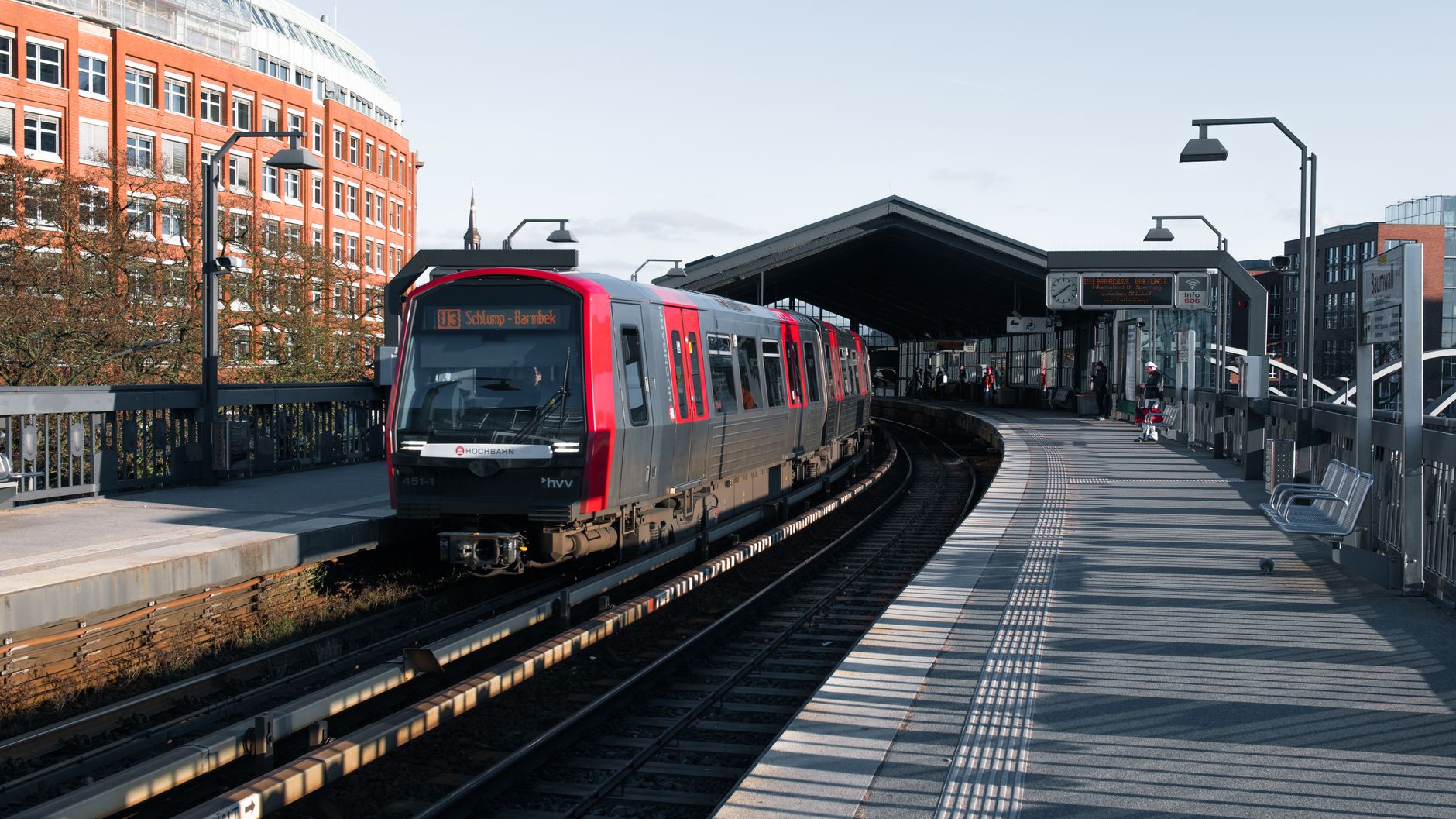 commuter train arriving at station platform