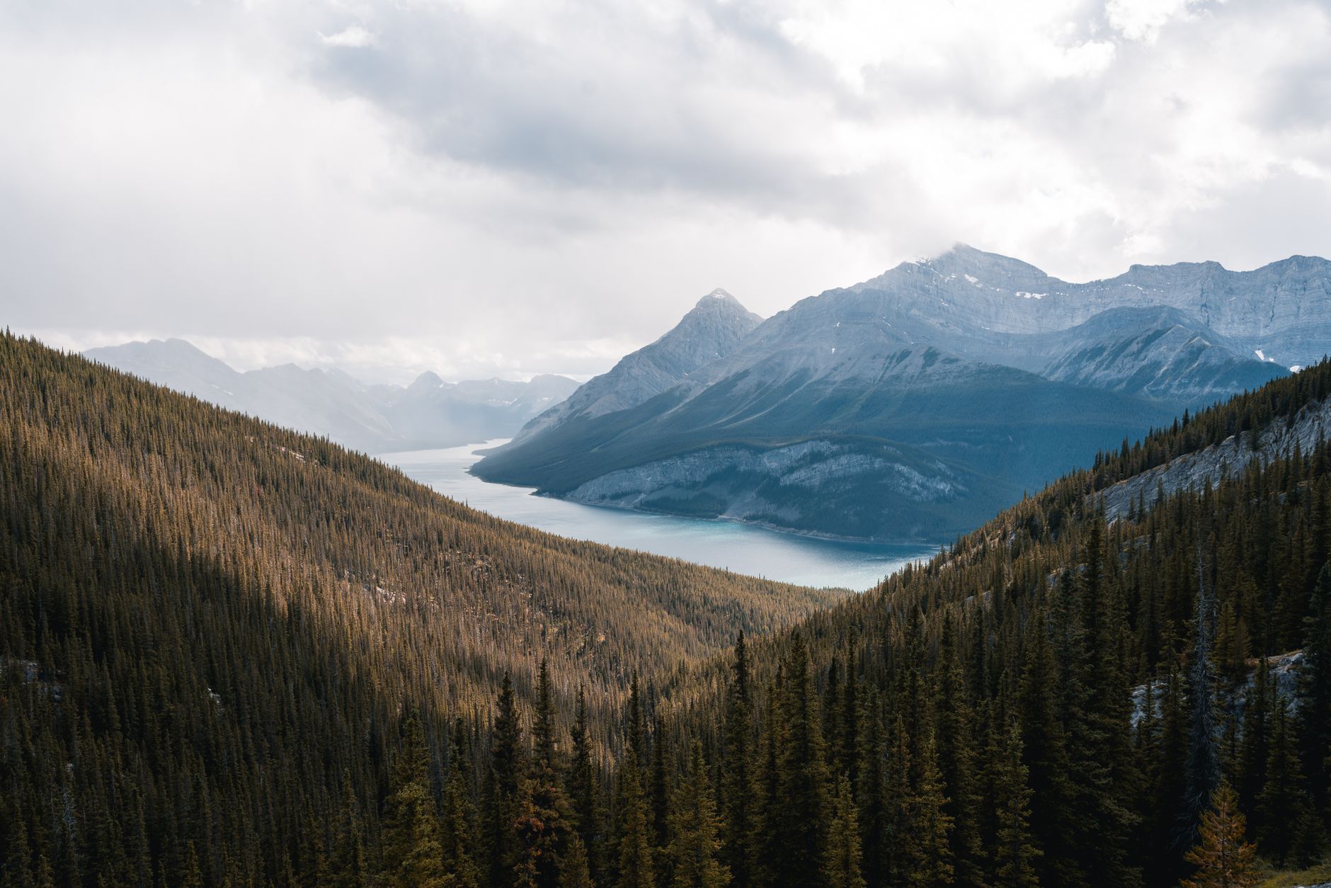 vast mountain landscape with clear lake canada