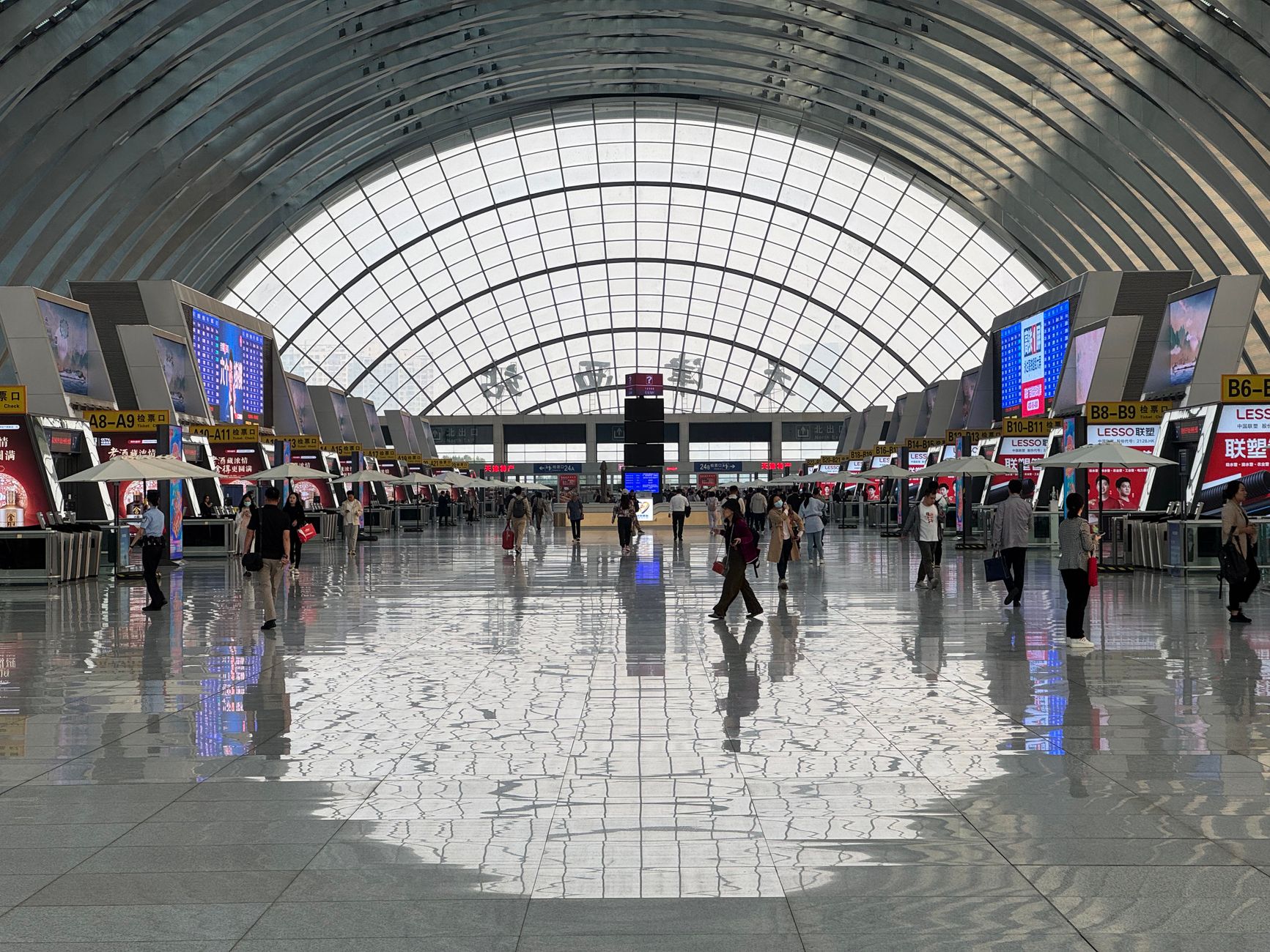 passengers walking inside airport terminal bustling