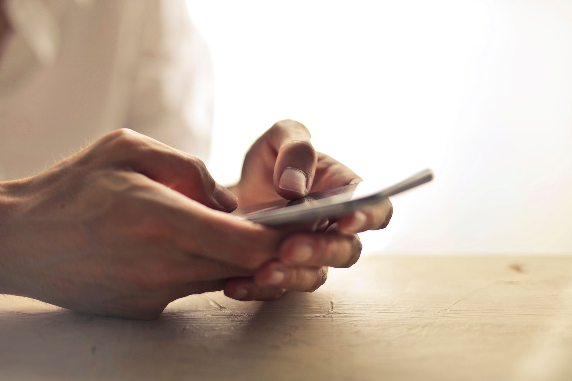 hand holding android phone browsing internet