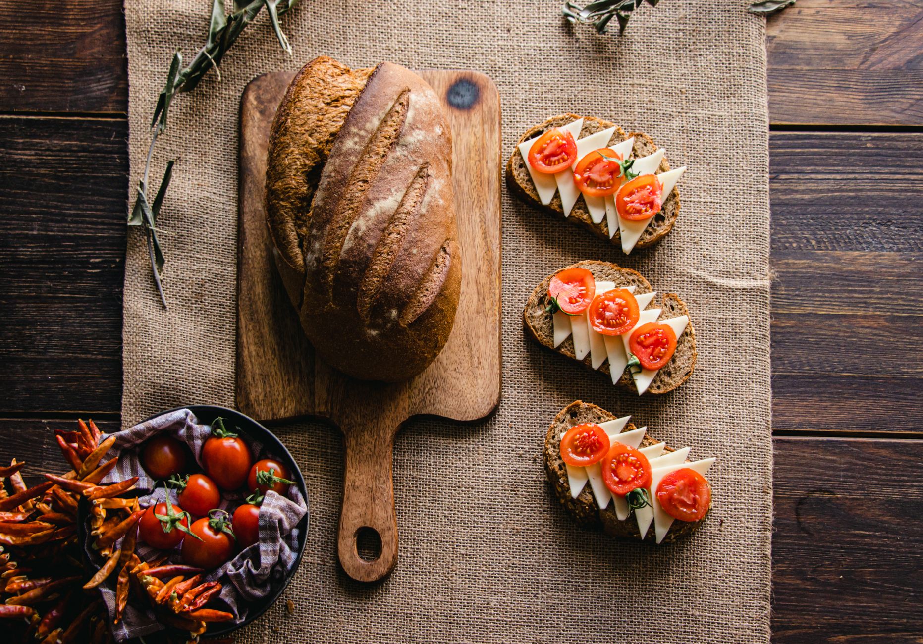 woman eating healthy sourdough bread sandwich