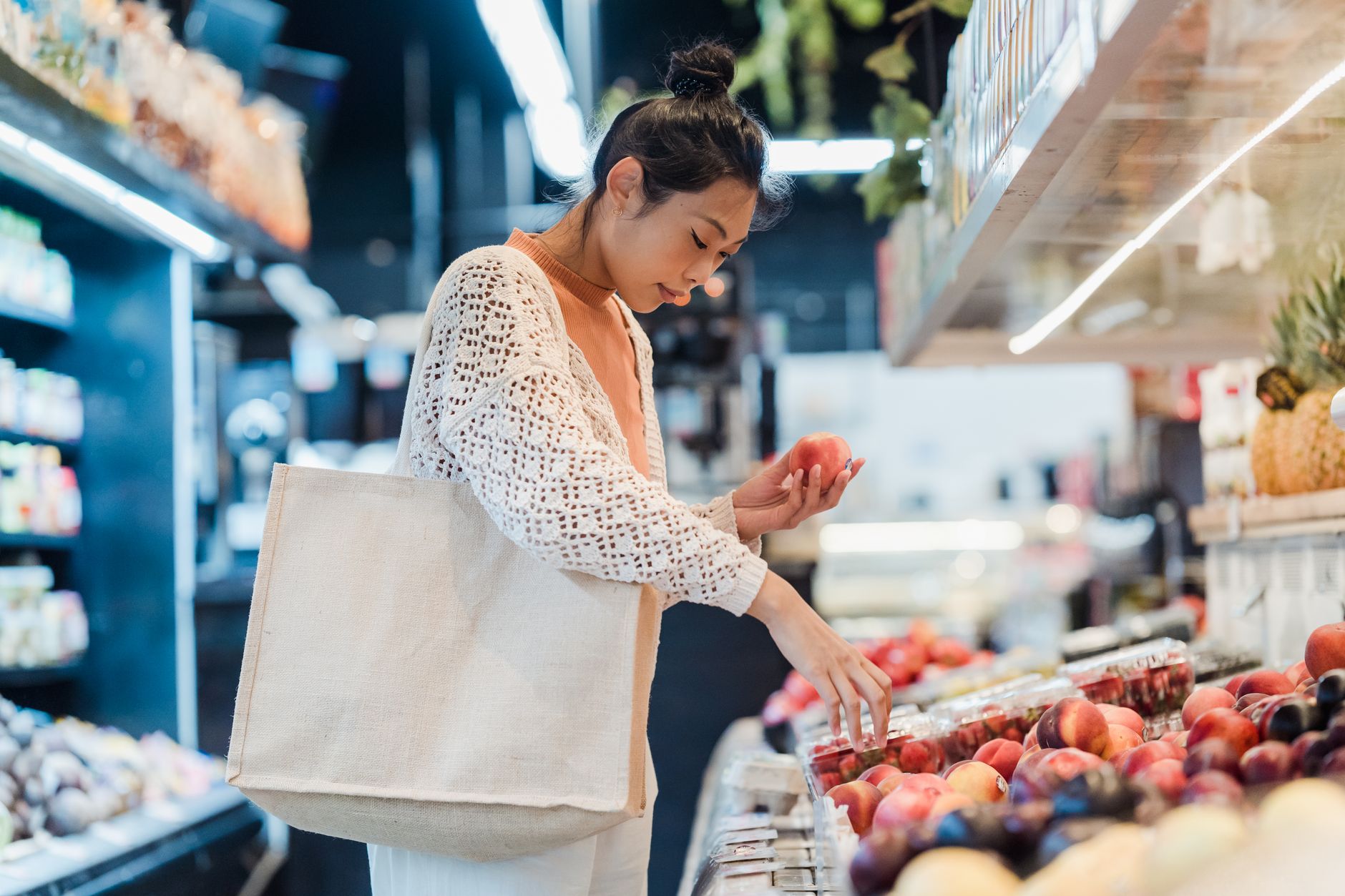 woman choosing healthy food at traditional warteg